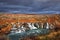 Hraunfossar waterfalls in autumn colors