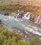 Hraunfossar Waterfalls, Iceland. Aerial view from drone on a summer day