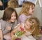 Hree little girls at birthday party having fun