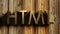 HTML brass write on wooden background - 3D rendering