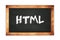 HTML text written on wooden frame school blackboard