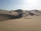 Huacachina Peru desert oasis lake and sand dunes