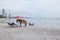 HUAHIN PRACHUAP KHIRI KHAN THAILAND -J UNE25,2016 : tourist horse keeper lying on beach chair with pony horse on huahin beach