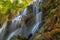 Huai Lao Waterfall in rain forest at Loei Province in Thailand , Soft focus