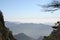 Huangshan Mountain in Anhui Province, China. A beautiful panoramic view of a valley on Huangshan looking over distant mountains