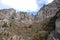 Huangshan Mountain in Anhui Province, China. Narrow Cliff between Turtle Peak and Lotus Peak with walkers on the steep paths