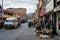 Huaraz, Peru, July 28, 2014: daily life hustle in andean city street with food vendors and vehicles