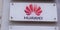 Huawei logo sign and brand text on entrance office corporation Chinese technology