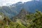 Huayna Picchu, or Wayna Pikchu, mountain in clouds rises over Machu Picchu Inca citadel, lost city of the Incas