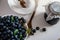 Huckleberry Jam close-up. Blueberry and sugar in a bowl in the kitchen