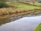 Huddersfield narrow canal reflection of train