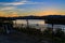 Hudson River at dusk in Hudson with lighthouse and boats