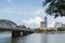 Hue, Vietnam - June 2019: panoramic view over city center and iron bridge over Perfume river