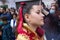 Huelva, Spain - April 10, 2022: Face of Altar girl or female acolyte in the holy week procession