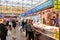 Huelva, Spain - December 11, 2020: Inside of Mercado del Carmen Market. People buying seafood , wearing protective face mask due