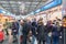 Huelva, Spain - December 11, 2020: Inside of Mercado del Carmen Market. People buying seafood , wearing protective face mask due