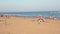Huelva, Spain - July 4, 2020: People are enjoying at afternoon of Islantilla beach
