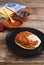 Huevos rancheros Mexican breakfast on a wooden base. Mexican cuisine. Copy space