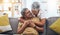 Hug, relax and senior couple on sofa for bonding, healthy marriage and relationship in living room. Retirement, love and