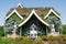 Huge beautiful amazing palace covered with green plants and colourful flowers