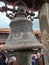 Huge bell of Bhaktapur uplifting by a man infront of Bhaktapur durbar
