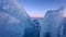 Huge blue ice hummocks on frozen surface of Baikal lake