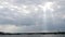 Huge boundless cloudy sky over cloudy Petersburg. Bridge over the Neva river.