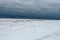 Huge buildup of ice and snow covering Lake Michigan on gloomy overcast day