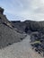 A huge caldera of an extinct volcano covered with black volcanic sand of Lanzarote Island