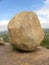 Huge circular granite rock at the top of mountain