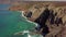 Huge cliffs on ocean shore