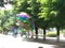 A huge colored soap bubble flies over the ground