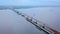 A huge Crimean bridge with cars. Clip . The view from the drone. A huge bridge with traffic on the background of the sea