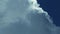 Huge cumulonimbus high in the blue sky