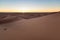 Huge desert dunes of Erg Chigaga, at the gates of the Sahara, al amanecer. Morocco. Concept of travel and adventure