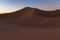 Huge desert dunes of Erg Chigaga, at the gates of the Sahara, al amanecer. Morocco. Concept of travel and adventure