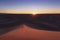 Huge desert dunes of Erg Chigaga, at the gates of the Sahara, at sunset. Morocco. Concept of travel and adventure