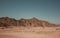 Huge desert dunes in Hammada desert Egypt with rocky mountain scenery. Great place for photographers and travelers. Beautiful sand