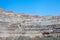 Huge dump trucks in an open pit Copper mine