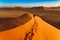 Huge dune and tourists