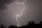 Huge fork lightnings and thunder during heavy summer storm.