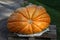 Huge freshly harvest pumpkin at a local farmer\\\'s market to be used for the holidays