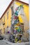 Huge giant metal rabbit made out of junk on side of house in Vila Nova de Gaia, Porto, Portugal
