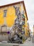 Huge giant metal rabbit made out of junk on side of house in Vila Nova de Gaia, Porto, Portugal