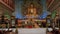 Huge golden buddha statue at buddhist monastery from flat angle