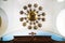 a huge Golden chandelier on the ceiling in the temple