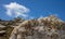 Huge granite volcanic rock in Volax village Tinos island, Cyclades Greece. Summer day, blue sky