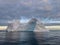 A huge high breakaway glacier drifts in the southern ocean off the coast of Antarctica at sunset, the Antarctic