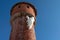 Huge icicle hanging from the top of the water tower