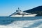 Huge luxury yacht cruising offshore